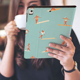 a girl is holding and viewing personalized iPad folio case with Summer design
