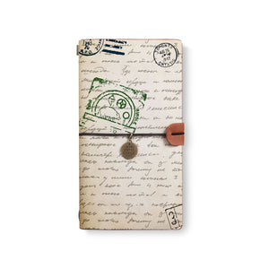 the front top view of midori style traveler's notebook with Travel design