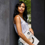 A yong girl holding personalized microsoft surface laptop case with Marble Flower design