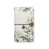 the front top view of midori style traveler's notebook with 3 design