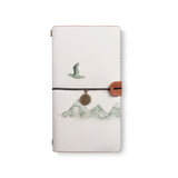 the front top view of midori style traveler's notebook with 3 design