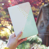 a girl holding personalized RFID blocking passport travel wallet with Simple Scandi Luxe design